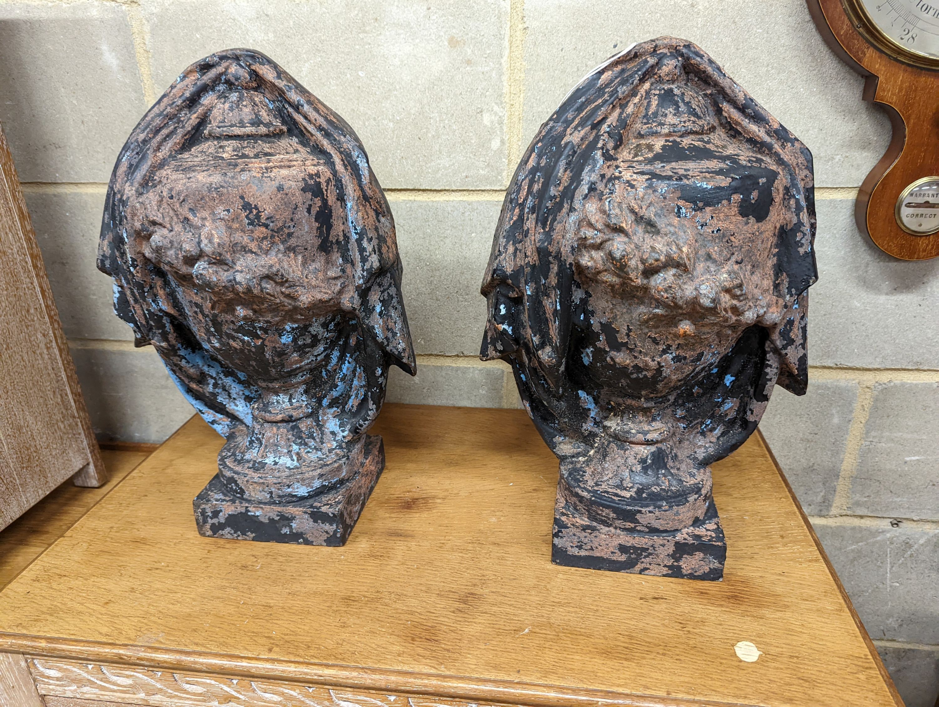 A pair of cast iron urn shaped finials. H-48cm.